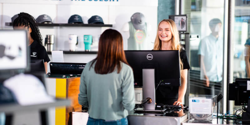 Guests checking in at Topgolf